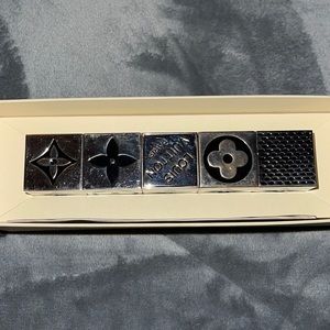 Preloved Louis Vuitton monogram cube dice 2011 black and silver magnets.